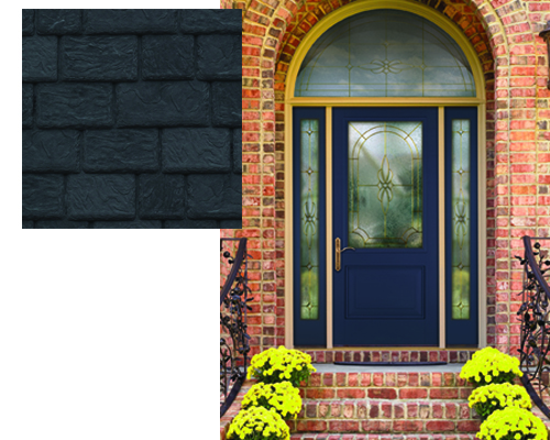 Slate black plastic roofing materials on a brick home