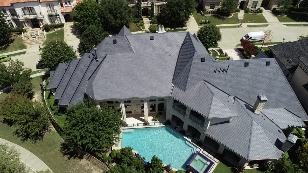 composite slate roof on residential home with backyard pool