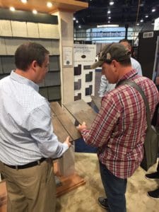 Technical Service Manager Tyler Storfa talking to builders about our new Hand-Split Shake Siding.