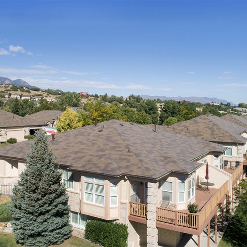Broadmoor's worry-free DaVinci roof set against a steel-blue sky (which is also worry-free).