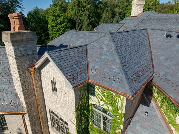 In addition to added beauty, this showcase composite slate roof will protect this home with impact- and fire-resistance as well as low maintenance for decades to come.