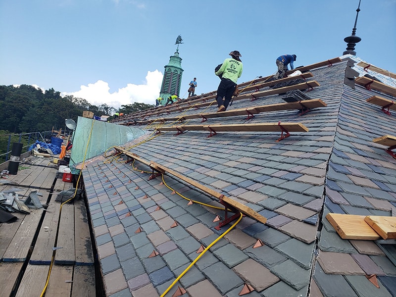Thanks to the authentic color pattern, the synthetic slate roof on this historic school helped keep its history intact for generations to come. 