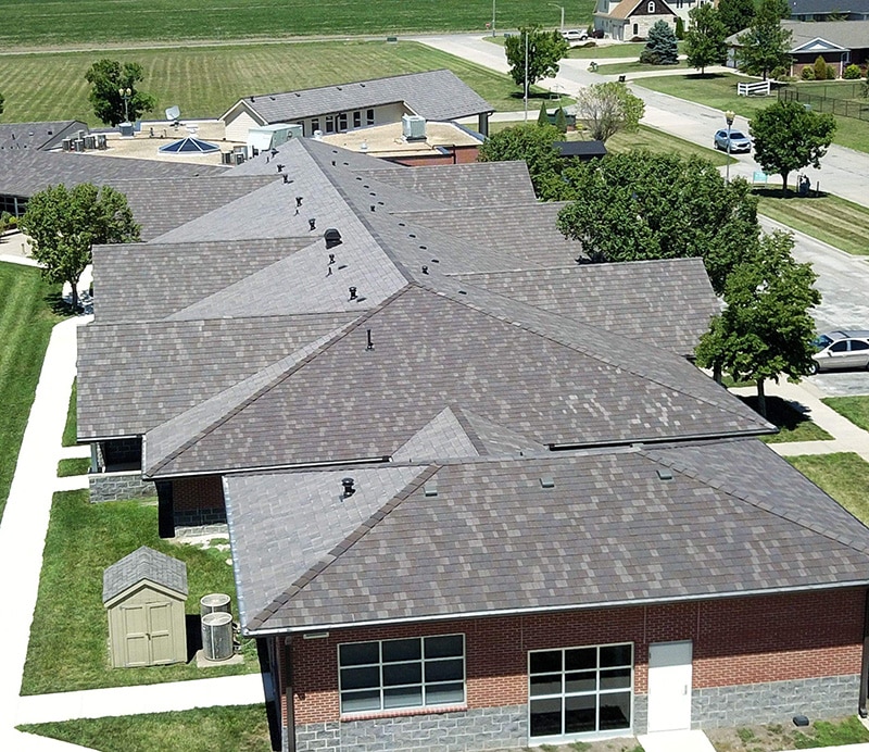 The Meadows worked with color expert Kate Smith to ensure the new roof had the authentic appearance of wood shake and also complemented the buildings. 