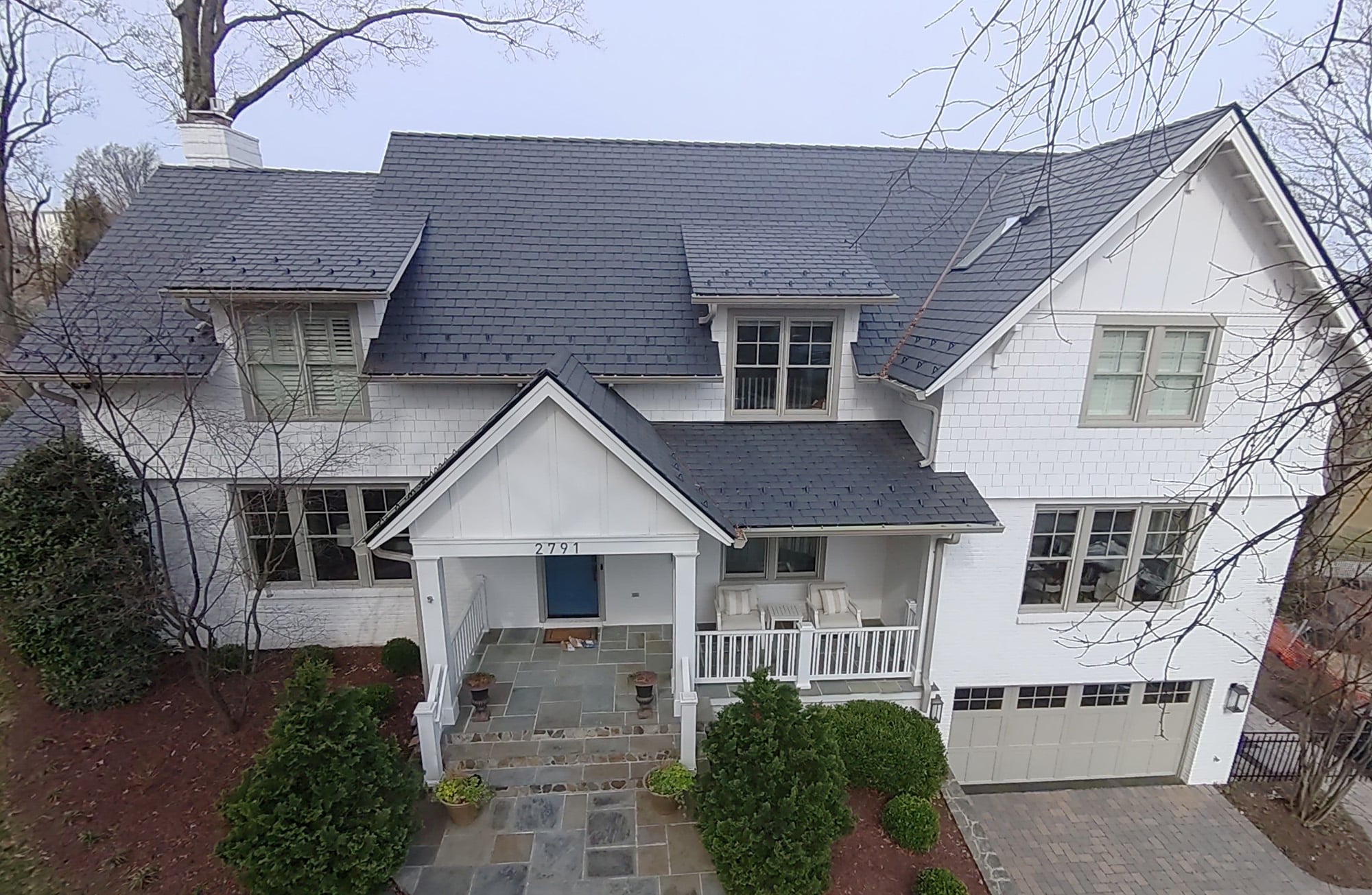By discovering their synthetic slate roofing solution, these homeowners eliminated flying shingles every time the wind picks up. 